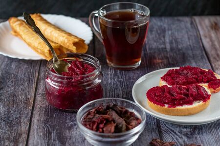 Sandwiches with natural, homemade beetroot jam, vanilla and sugar. Homemade waffles. Healthy food, vegetarianism.の写真素材