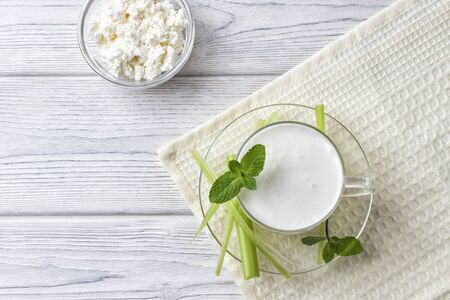 Airan or kefir drink, fermented milk drink, fermented probiotics on a white backgroundの写真素材