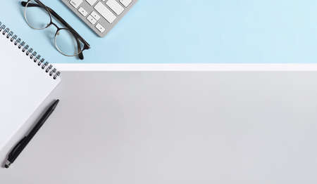 Workspace Real photo, graphic, striped background in pastel colors light gray and blue, white. Male...