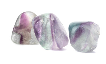 Set mineral natural semiprecious stone fluorite gemstone. isolated on a white background. Geology. Dreen and violetの写真素材