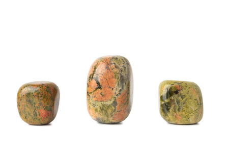 Set mineral natural semiprecious stone unakite. isolated on a white background. Geology. purple sequinsの写真素材