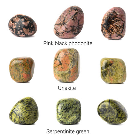 Set mineral natural semiprecious stone unakite, serpentinite green, pink black phodonite gemstone. isolated on a white background. Geology.の写真素材