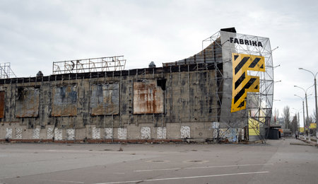 Kherson, Ukraine - 01. 11. 2023: Shopping center Fabrika shelled in destroyed by Russian troops, occupation, war. Fire damage to civilian infrastructure.のeditorial素材