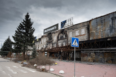 Kherson, Ukraine - 01. 11. 2023: Shopping center Fabrika, McDonald's shelled in destroyed by Russian troops, occupation, war. Fire damage to civilian infrastructure.のeditorial素材