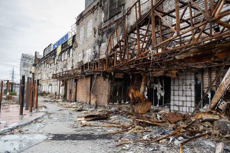 Kherson, Ukraine - 01. 11. 2023: Shopping center Fabrika, lc waikiki shelled in destroyed by Russian troops, occupation, war. Fire damage to civilian infrastructure.のeditorial素材
