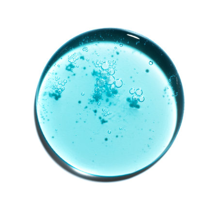 Texture swatch of blue hyaluronic acid serum gel on white isolated background, macro. Detergent, cosmetics, laboratory. A round drop in a petri dishの写真素材
