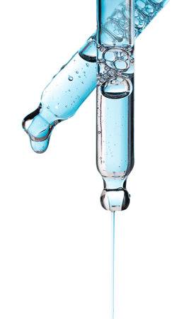 Set pipette serum blue drop with clear liquid niacinamide, hyaluronic or Aha Bha acids on a white isolated background. Textured swatch skincare. Laboratory cosmeticsの写真素材