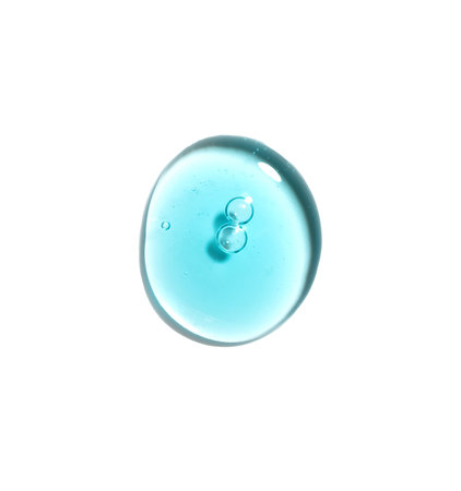 Texture swatch of blue hyaluronic acid serum gel on white isolated background, macro. Detergent, cosmetics, laboratory. A round drop in a petri dishの写真素材