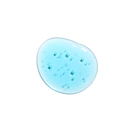 Texture swatch of blue hyaluronic acid serum gel on white isolated background, macro. Detergent, cosmetics, laboratory. A round drop in a petri dishの写真素材