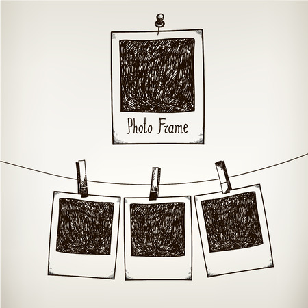 Vector hand drawn doodle illustration of retro photo frame. Hanging photos in a photo studio.のイラスト素材