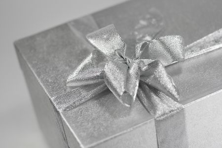 silver gift box witn a bowの写真素材
