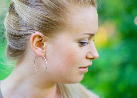 outdoor portrait of attractive blonde