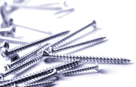 metal screws closeup on white backgroundの写真素材