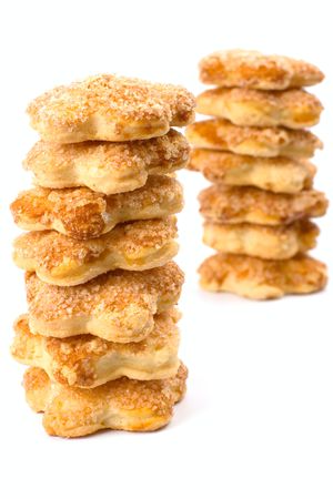 two stacks of cookies on white background
