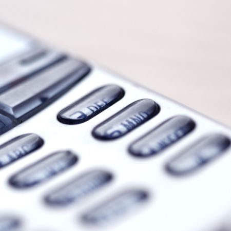 mobile phone closeup toned in blueの写真素材