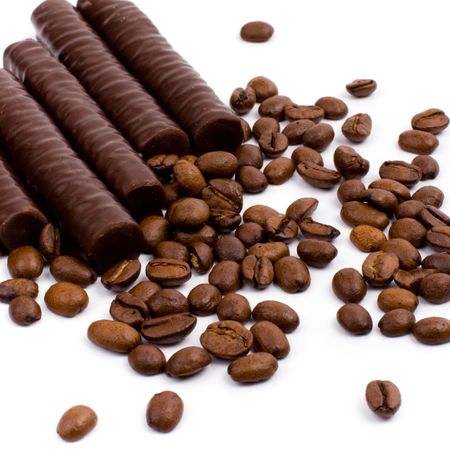 chocolate bars and coffee beans on white backgroundの写真素材