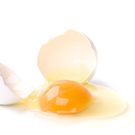 broken egg isolated on white background