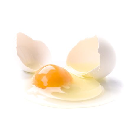 broken egg isolated on white backgroundの写真素材