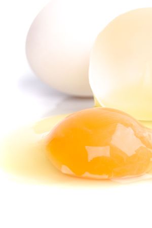 broken egg isolated on white backgroundの写真素材