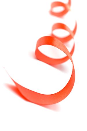 red satin ribbon closeup on white backgroundの写真素材