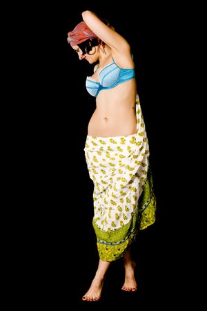 attractive woman dances east dance isolated on black backgroundの写真素材