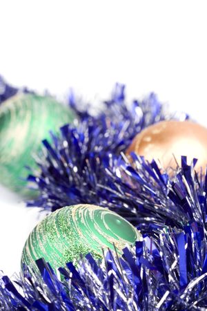 golden and green christmas balls and tinsel closeupの写真素材