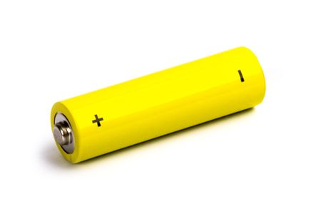 yellow alkaline battery isolated on white backgroundの写真素材