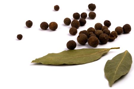 aromatic pepper and bay leaves on white backgroundの写真素材
