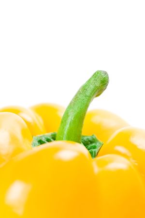 yellow bell pepper closeup on white backgroundの写真素材