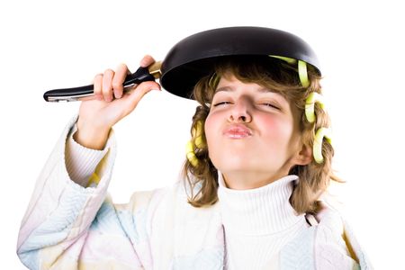 crazy housewife with pan as hat isolated on white backgroundの写真素材