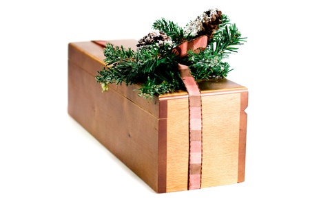 wooden gift box with xmas decoration isolated on white backgroundの写真素材