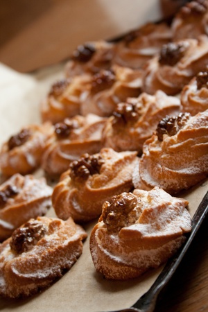 closeup image of fresh baked rispy cookies with walnuts