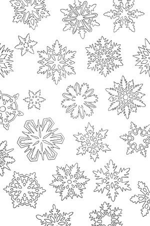 a lot of paper white cutout snowflakes on backgroundの写真素材