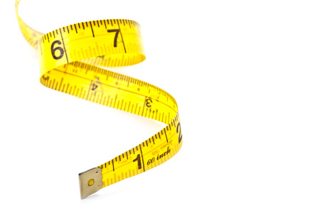 yellow measuring tape isolated on white background