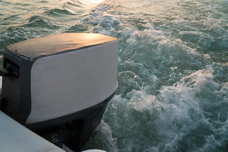Motor boat close-up. Waves on the water.