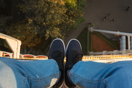 A man is riding a Ferris wheel.の写真素材