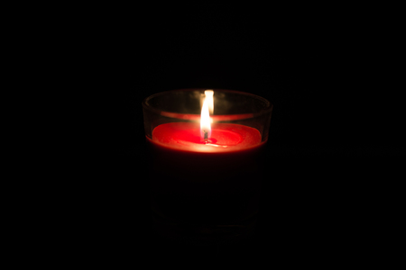 The red Candle with the Dark Background.の写真素材