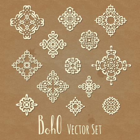 Set of different ethnic signs and design elements with shadows and Boho hand drawn lettering. On cardboard texture craft paper background. Vector illustration.のイラスト素材