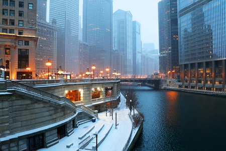 Beautiful Chicago downtown cityscape twilight winter view during snowfall. Illinois, Midwest USA.の写真素材