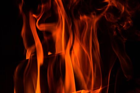 Close up, macro. Abstrack background. Orange flames in the fireplace. Copy space.の写真素材
