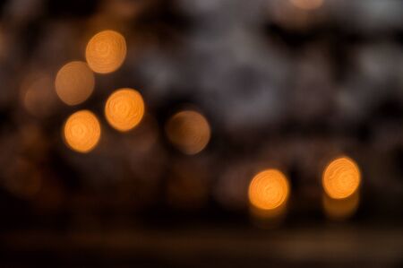 Blurred Christmas background. Warm light garland are defocused. Texture.の写真素材