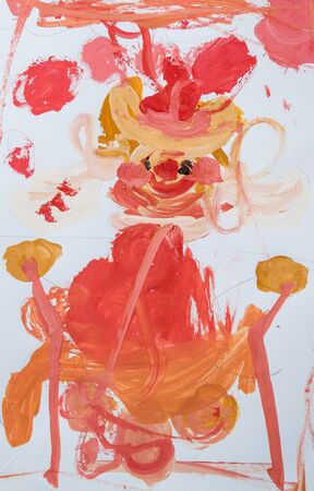 Close up. Portrait of a cute clown juggler in a circus. Children's drawing paints. Creative activities with children 4-5 years old on the development of fine motor skills.の写真素材