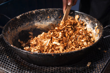 Close up. Frying finely chopped meat in a pan.