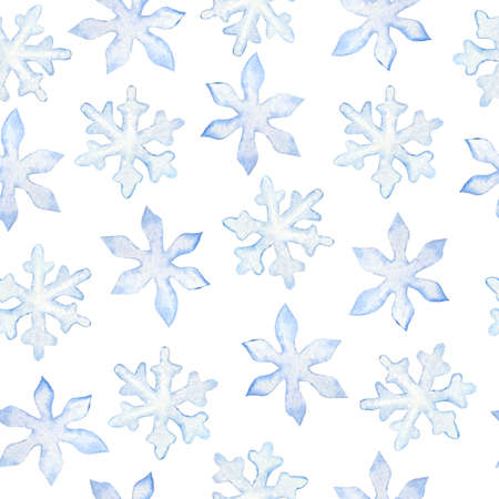 Watercolor hand drawn seamless pattern with blue snowflakes. Christmans New Year snow design in nordic scandinavian style. Snowfall background for holiday greeting cards wrapping paper.の写真素材