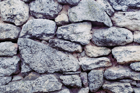 Background wall with raw stone.の写真素材