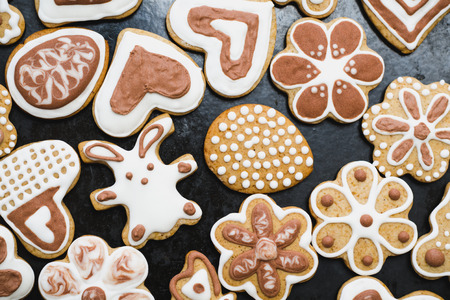 Gingerbread cookies in the form of a rabbit, flowers, hearts, grandmothers and Easter eggs, covered...