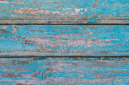 Wooden boards with traces of old blue paint, textureの写真素材