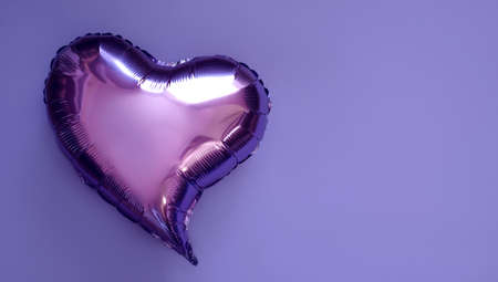 Balloon in the shape of a heart, isolated against the background of the color of the year Very Peri with copy space. Template with Valentine's Day. Shiny purple foil balloonの写真素材