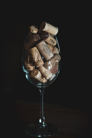 wine corks in the wine glass. isolated background