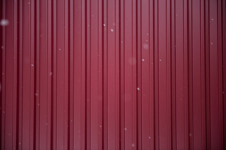 falling snowflakes on a red backgroundの写真素材
